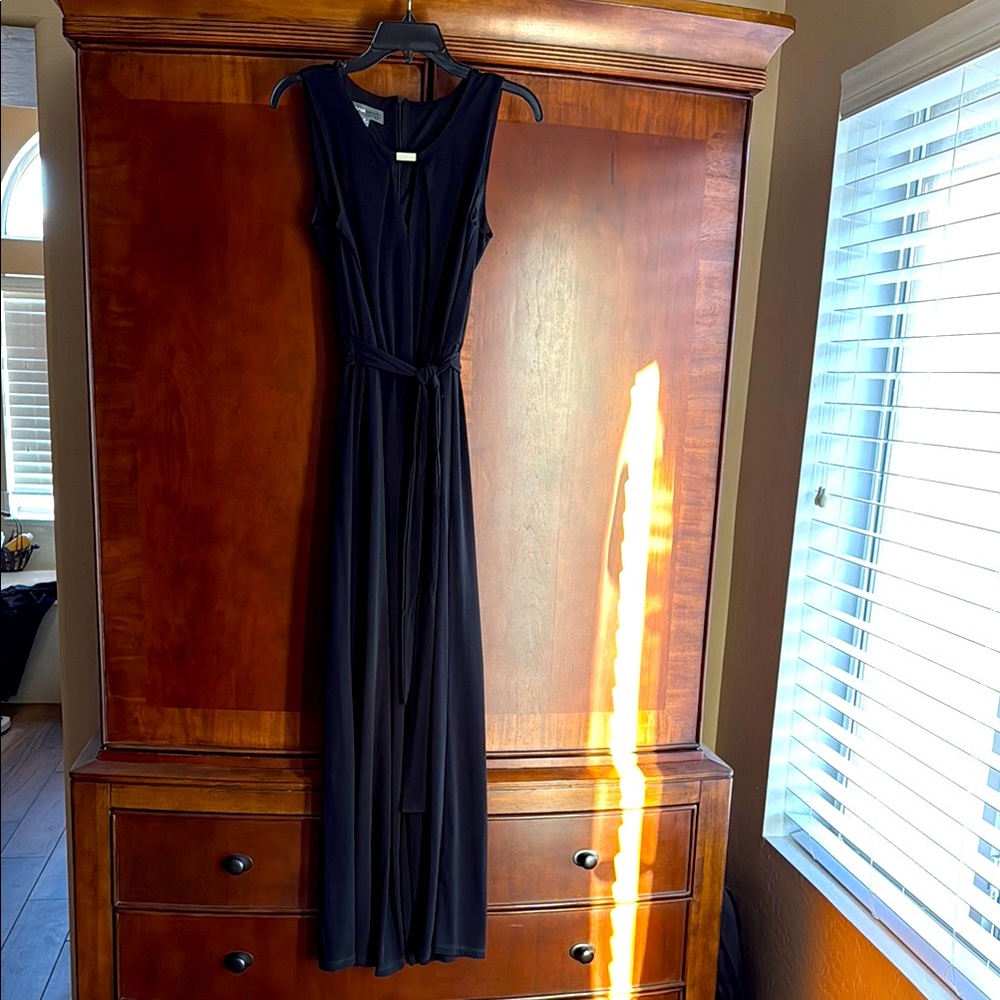 Donna Ricco Sleeveless Black Jumpsuit with Silver Accent and Tie Belt at Waist